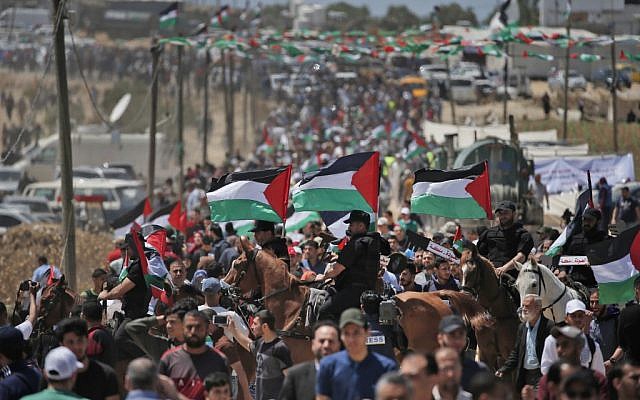 Palestinian demonstrators gather east of Gaza City in the Gaza Strip on May 15, 2019, during a protest marking 71st anniversary of the "Nakba," or "Catastrophe," in 1948. (Mahmud Hams/AFP) Palestinian demonstrators gather east of Gaza City in the Gaza Strip on May 15, 2019, during a protest marking 71st anniversary of the "Nakba," or "Catastrophe," in 1948. (Mahmud Hams/AFP)