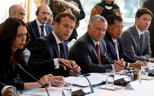 New Zealand's Prime Minister Jacinda Ardern (L) and French President Emmanuel Macron (C-L) attend a launching ceremony for the 'Christchurch call,' an anti-violence initiative at the Elysee Palace in Paris, on May 15, 2019. (Charles Platiau/AFP) New Zealand's Prime Minister Jacinda Ardern (L) and French President Emmanuel Macron (C-L) attend a launching ceremony for the 'Christchurch call,' an anti-violence initiative at the Elysee Palace in Paris, on May 15, 2019. (Charles Platiau/AFP)