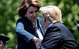 US President Donald Trump shakes hands with House Speaker Nancy Pelosi as they attend the 38th Annual National Peace Officers Memorial Service on May 15, 2019, in Washington. (Photo by Brendan Smialowski/AFP)