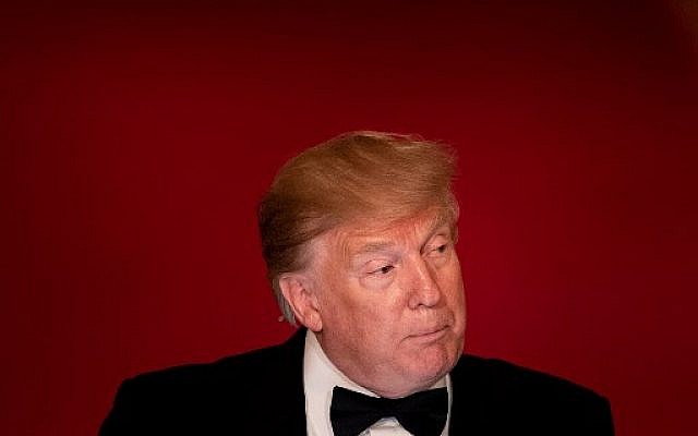 US President Donald Trump pauses while speaking during White House Historical Association Dinner in the East Room of the White House on May 15, 2019, in Washington, DC. (Photo by Brendan Smialowski / AFP) US President Donald Trump pauses while speaking during White House Historical Association Dinner in the East Room of the White House on May 15, 2019, in Washington, DC. (Photo by Brendan Smialowski / AFP)