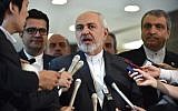 Iranian Foreign Minister Mohammad Javad Zarif (C) answers questions after a meeting with Japanese Foreign Minister Taro Kono at the foreign ministry in Tokyo on May 16, 2019. (Photo by Kazuhiro NOGI / AFP)