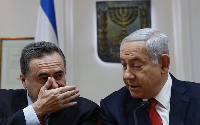 Prime Minister Benjamin Netanyahu (R) listens to then-transportation minister Yisrael Katz during a weekly cabinet meeting at the Prime Minister's Office in Jerusalem, on May 19, 2019. (Ariel Schalit / various sources / AFP) Prime Minister Benjamin Netanyahu (R) listens to then-transportation minister Yisrael Katz during a weekly cabinet meeting at the Prime Minister's Office in Jerusalem, on May 19, 2019. (Ariel Schalit / various sources / AFP)
