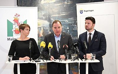 Katrin Stjernfeldt Jammeh, left, of the Social Democrats, Swedish Prime Minister and Social Democratic Party leader Stefan Loefven, center, and Roko Kursar of The Liberals give a joint press conference on May 24, 2019 in Malmo, Sweden, announcing the country will hold an international conference against anti-Semitism in 2020. (Johan Nilsson/TT News Agency/AFP)