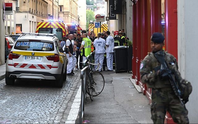 French security and emergency services block the area following a suspected package bomb exploded along a pedestrian street in the heart of Lyon, southeast France, on May 24, 2019. (Philippe Desmazes/AFP) French security and emergency services block the area following a suspected package bomb exploded along a pedestrian street in the heart of Lyon, southeast France, on May 24, 2019. (Philippe Desmazes/AFP)