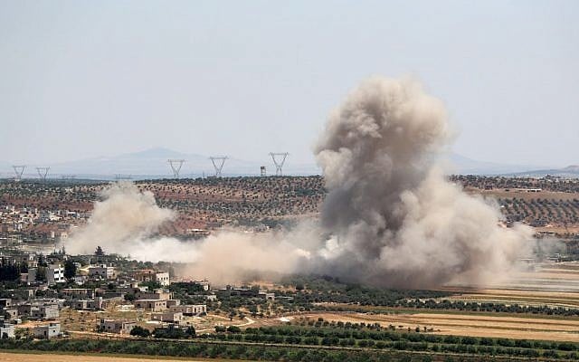 Smoke billows during reported Syrian government forces' bombardments on the village of Sheikh Mustafa in the southern countryside of the jihadist-held Idlib province on May 27, 2019. (OMAR HAJ KADOUR/AFP) Smoke billows during reported Syrian government forces' bombardments on the village of Sheikh Mustafa in the southern countryside of the jihadist-held Idlib province on May 27, 2019. (OMAR HAJ KADOUR/AFP)