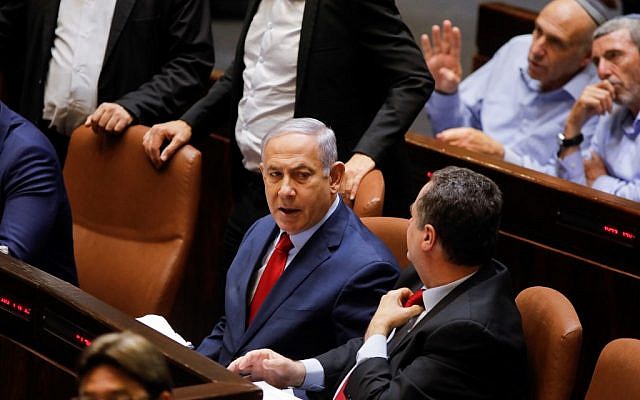 Prime Minister Benjamin Netanyahu sits before a vote on a bill to dissolve the Knesset on May 29, 2019, at the Knesset in Jerusalem. (Menahem Kahana/AFP) Prime Minister Benjamin Netanyahu sits before a vote on a bill to dissolve the Knesset on May 29, 2019, at the Knesset in Jerusalem. (Menahem Kahana/AFP)