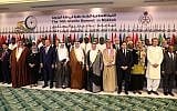 Arab and Islamic states foreign ministers pose for a family picture during a meeting of the Organisation of Islamic Cooperation (OIC) and Arab League member states' top diplomats in Jeddah on May 30, 2019, ahead of the Gulf, Arab, and Islamic summits to be held in the holy city of Mecca on May 30 and 31, 2019. (Bandar Aldandani/AFP)