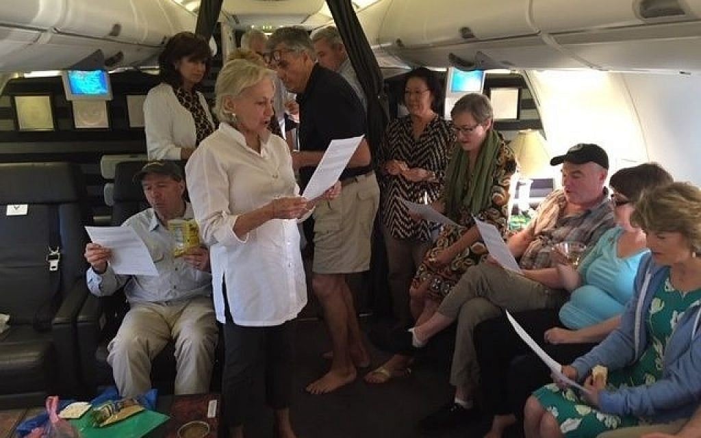 Jill Cooper Udall leads a seder aboard a US military aircraft 30,000 feet over Vietnam, April 19, 2019. (Courtesy of Cooper Udall) Jill Cooper Udall leads a seder aboard a US military aircraft 30,000 feet over Vietnam, April 19, 2019. (Courtesy of Cooper Udall)