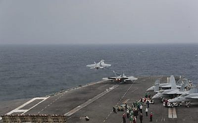 Two F/A-18E Super Hornets launch from the flight deck of the Nimitz-class aircraft carrier USS Abraham Lincoln in the Mediterranean Sea while the ship travels to the Persian Gulf, April 25, 2019. (US Navy/Matt Herbst)