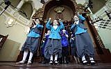 Illustrative: Children play musical instruments during the celebration of Hanukkah at the Kharkiv Choral Synagogue, in Kharkiv, northeastern Ukraine, December 5, 2018. (Vyacheslav Madiyevskyy/Barcroft Media via Getty Images)