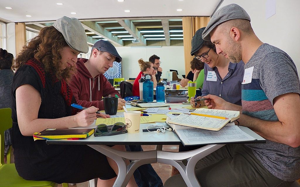 Andrew Mandel, right, founded Yom HaTzedek after seeing how few Jews came to protests and advocacy work, contrasted with the masses that "begrudgingly attend" synagogue for the High Holidays. (Lev Gringauz) Andrew Mandel, right, founded Yom HaTzedek after seeing how few Jews came to protests and advocacy work, contrasted with the masses that "begrudgingly attend" synagogue for the High Holidays. (Lev Gringauz)