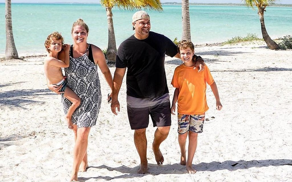 Justin Zackham and his family in the Bahamas. (Courtesy of the Anderson Group/via JTA) Justin Zackham and his family in the Bahamas. (Courtesy of the Anderson Group/via JTA)