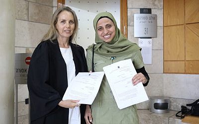 Arab Israeli poet Dareen Tatour (right) and lawyer Gabi Lasky at the Nazareth District Court, May 16, 2019. (Facebook)