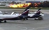 This image taken from video provided by Instagram user @artempetrovich, shows the SSJ-100 aircraft of Aeroflot Airlines on fire during an emergency landing in Sheremetyevo airport in Moscow, Russia, Sunday, May 5, 2019. (@artempetrovich via AP)
