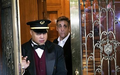 Michael Cohen, former attorney to President Donald Trump, leaves his apartment building before beginning his prison term, on May 6, 2019, in New York. (AP Photo/Kevin Hagen)