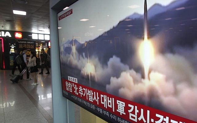 Illustrative: A TV screen shows file footage of a North Korean missile launch during a news program at the Seoul Railway Station in Seoul, South Korea, May 4, 2019. (Ahn Young-joon/AP) Illustrative: A TV screen shows file footage of a North Korean missile launch during a news program at the Seoul Railway Station in Seoul, South Korea, May 4, 2019. (Ahn Young-joon/AP)