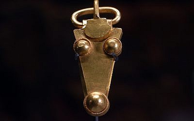 A golden belt buckle uncovered at an Anglo-Saxon burial site in the village of Prittlewell in 2003 on display at Southend Central Museum in Southend, England, Thursday, May 8, 2019. (AP Photo/James Brooks)