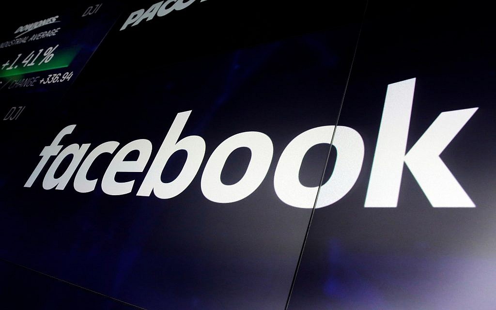 In this file photo from March 29, 2018, the logo for Facebook appears on screens at the Nasdaq MarketSite, in New York's Times Square. (AP Photo/Richard Drew, File) In this file photo from March 29, 2018, the logo for Facebook appears on screens at the Nasdaq MarketSite, in New York's Times Square. (AP Photo/Richard Drew, File)