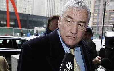 In this Jan. 13, 2011 file photo, Conrad Black arrives at the federal building in Chicago. President Donald Trump has granted a full pardon to Black, a former newspaper publisher who has written a flattering political biography of Trump. Black's media empire once included the Chicago Sun-Times and The Daily Telegraph of London. (AP Photo/Charles Rex Arbogast) In this Jan. 13, 2011 file photo, Conrad Black arrives at the federal building in Chicago. President Donald Trump has granted a full pardon to Black, a former newspaper publisher who has written a flattering political biography of Trump. Black's media empire once included the Chicago Sun-Times and The Daily Telegraph of London. (AP Photo/Charles Rex Arbogast)