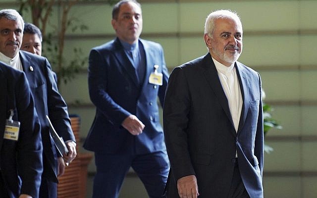 Iranian Foreign Minister Mohammad Javad Zarif, right, walks to meet Japanese Prime Minister Shinzo Abe at Abe's official residence in Tokyo, May 16, 2019. (Eugene Hoshiko/Pool/AP) Iranian Foreign Minister Mohammad Javad Zarif, right, walks to meet Japanese Prime Minister Shinzo Abe at Abe's official residence in Tokyo, May 16, 2019. (Eugene Hoshiko/Pool/AP)