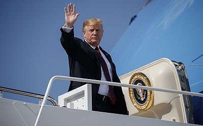 President Donald Trump waves as he boards Air Force One for a trip to New York to attend a fundraiser, Thursday, May 16, 2019, at Andrews Air Force Base, Md. (AP Photo/Evan Vucci)