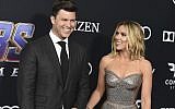 In this April 22, 2019, file photo, Colin Jost, left, and Scarlett Johansson arrive at the premiere of "Avengers: Endgame" at the Los Angeles Convention Center. Wedding bells are in the future for actress Scarlett Johansson and Saturday Night Live's Colin Jost. Johansson's publicist Marcel Pariseau tells The Associated Press Sunday, May 19, 2019, that the private couple is officially engaged after two years of dating. Pariseau says no date has been set for the nuptials. (Photo by Jordan Strauss/Invision/AP, File)