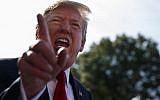 US President Donald Trump talks with reporters before departing on Marine One for the Air Force Academy graduation ceremony on May 30, 2019, in Washington. (AP Photo/Evan Vucci)