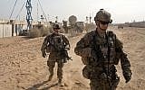 US Army soldiers move through Qayara West Coalition base in Qayara, some 50 kilometers south of Mosul, Iraq,  November 9, 2016. (AP/Marko Drobnjakovic)