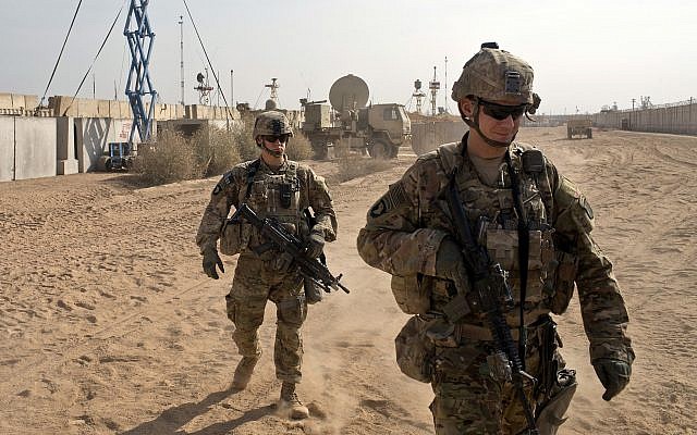 US Army soldiers move through Qayara West Coalition base in Qayara, some 50 kilometers south of Mosul, Iraq, November 9, 2016. (AP/Marko Drobnjakovic) US Army soldiers move through Qayara West Coalition base in Qayara, some 50 kilometers south of Mosul, Iraq, November 9, 2016. (AP/Marko Drobnjakovic)