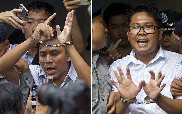 Reuters journalists Kyaw Soe Oo, left, and Wa Lone, are handcuffed as they are escorted by police out of the court Monday, Sept. 3, 2018, in Yangon, Myanmar after being sentenced to seven years in prison. (AP /Thein Zaw) Reuters journalists Kyaw Soe Oo, left, and Wa Lone, are handcuffed as they are escorted by police out of the court Monday, Sept. 3, 2018, in Yangon, Myanmar after being sentenced to seven years in prison. (AP /Thein Zaw)