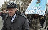 Boris Johnson arrives at the Houses of Parliament, in London, March 27, 2019, for vote on alternatives for leaving the European Union. (Dominic Lipinski/PA PA via AP)