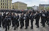 Illustrative: Police secure the demonstration of the far-right party 'Rise of German Patriots' in Leipzig, Germany, May 1, 2019. (Heiko Rebsch/dpa via AP)