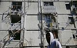 Damage is seen in a residential area after it was hit a by a rocket fired from Gaza in the southern Israeli city of Ashkelon,, May 5, 2019. (AP/Ariel Schalit)