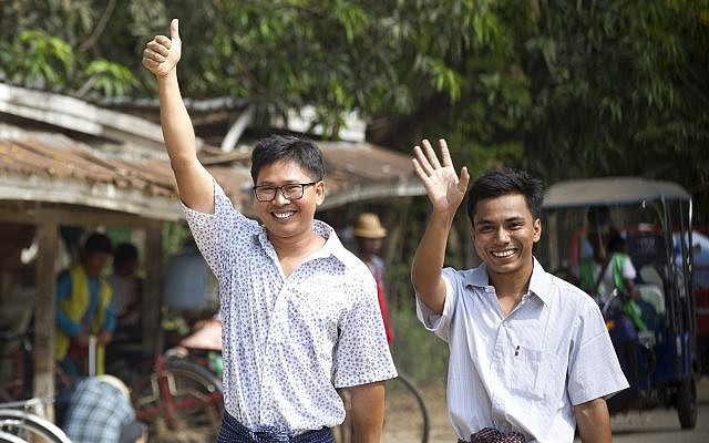 Reuters journalists Wa Lone, left, and Kyaw She Oo wave as they walk out from Insein Prison after being released in Yangon, Myanmar, May 7, 2019 (AP Photo/Thein Zaw) Reuters journalists Wa Lone, left, and Kyaw She Oo wave as they walk out from Insein Prison after being released in Yangon, Myanmar, May 7, 2019 (AP Photo/Thein Zaw)