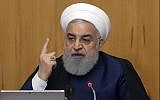In this photo released by the official website of the office of the Iranian Presidency, Iran's President Hassan Rouhani speaks in a cabinet meeting in Tehran, Iran, May 8, 2019. (Iranian Presidency Office via AP)
