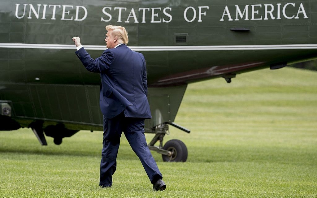 US President Donald Trump walks on the South Lawn of the White House in Washington, May 8, 2019. (Andrew Harnik/AP) US President Donald Trump walks on the South Lawn of the White House in Washington, May 8, 2019. (Andrew Harnik/AP)