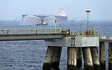 In this Sept. 21, 2016 photo, an oil tanker approaches to the new Jetty during the launch of the new $650 million oil facility in Fujairah, United Arab Emirates (AP Photo/Kamran Jebreili)