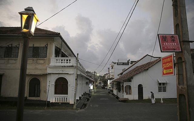 In this Friday, May 10, 2019, photo, a street that is usually crowded with tourists is seen empty in Galle, Sri Lanka (AP Photo/Eranga Jayawardena)