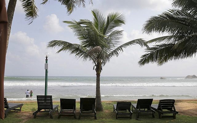 In this May 10, 2019, photo, lounge chairs lie on a deserted beach in Hikkaduwa, Sri Lanka (AP Photo/Eranga Jayawardena)