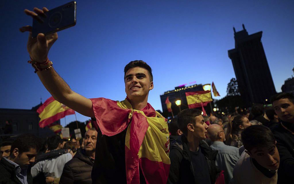 In this April 26, 2019 file photo, far-right Vox party supporters attend an election campaign event in Madrid, Spain (AP Photo/Bernat Armangue) In this April 26, 2019 file photo, far-right Vox party supporters attend an election campaign event in Madrid, Spain (AP Photo/Bernat Armangue)