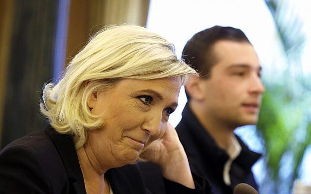 Leader of the French National Front Marine Le Pen, left, and Far-right top candidate of the National Rally party Jordan Bardella attend a press conference before a rally with right-wing EU leaders in Milan, Italy, Saturday, May 18, 2019 (AP Photo/Luca Bruno) Leader of the French National Front Marine Le Pen, left, and Far-right top candidate of the National Rally party Jordan Bardella attend a press conference before a rally with right-wing EU leaders in Milan, Italy, Saturday, May 18, 2019 (AP Photo/Luca Bruno)