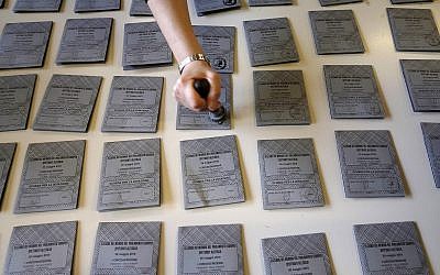 Ballots are being prepared ahead of Sunday's European Elections, in Rozzano, near Milan, Italy, May 25, 2019 (AP Photo/Antonio Calanni)