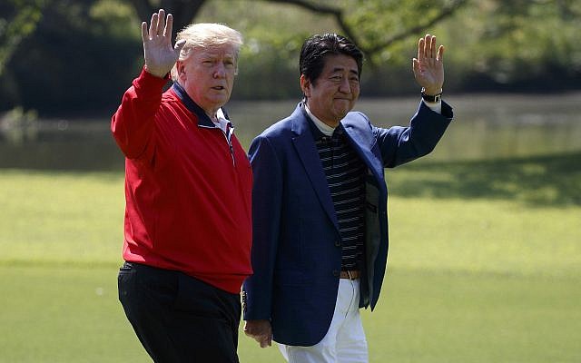 US President Donald Trump walks with Japanese Prime Minister Shinzo Abe before playing a round of golf at Mobara Country Club, in Chiba, Japan, on May 26, 2019. (AP Photo/Evan Vucci) US President Donald Trump walks with Japanese Prime Minister Shinzo Abe before playing a round of golf at Mobara Country Club, in Chiba, Japan, on May 26, 2019. (AP Photo/Evan Vucci)