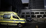 Illustrative: An ambulance drives past the main entrance of the Vila France de Xira hospital, near Lisbon, Portugal, Friday, Nov. 14, 2014.  (AP Photo/Francisco Seco)