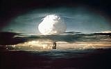 A mushroom cloud rises above the Pacific Ocean on November 1, 1952, during the world's first test of a full-scale thermonuclear device. (AP Photo/Los Alamos National Laboratory)