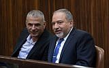 Finance Minister Moshe Kahlon, left, speaks with Yisrael Beytenu leader Avigdor Liberman in the Knesset, November 18, 2015. (Yonatan Sindel/Flash90)