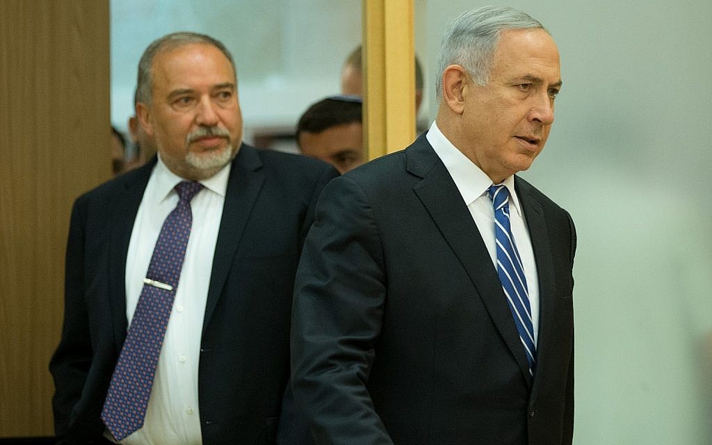 Prime Minister Benjamin Netanyahu (right) and Israel's then-new Defense Minister Avigdor Lieberman arrive at a joint press conference in the Knesset on May 30, 2016. (Yonatan Sindel/Flash90) Prime Minister Benjamin Netanyahu (right) and Israel's then-new Defense Minister Avigdor Lieberman arrive at a joint press conference in the Knesset on May 30, 2016. (Yonatan Sindel/Flash90)