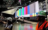 Workers prepare the stage ahead of the opening of the Eurovision Song Contest in Tel Aviv, on April 15, 2019.  (Flash90)