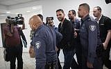 Netanel Sandrusi, suspected of being the driver who ran over an 11-year-old boy and then fled the scene is taken to court in Jerusalem, April 29, 2019. (Hadas Parush/Flash90)