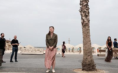 Israelis stand still during a two-minute siren in memory of 6 million Jews murdered in the Holocaust as Israel marks the National Holocaust Memorial Day, on May 2, 2019, in Tel Aviv.(Tomer Neuberg/Flash90)